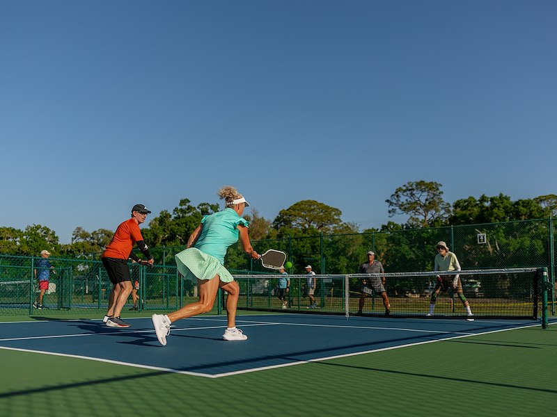 Guests playing pickleball at Sun Outdoors Sarasota